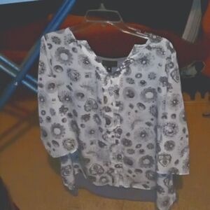 A casual black white and gray blouse